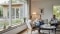 Et roligt og lyst indendørsbillede af en moderne, dansk dagligstue med store vinduer, der vender ud mod en velholdt have og et træhus. Billedet viser to kvinder og en mand i 40-50-årsalderen, der slapper af og nyder et øjeblik sammen.