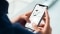 Billedet viser en smartphone med ViCare-appen åben.